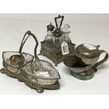 A silver cruet set together with a pickle dish and shaving jug
