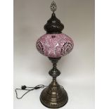 A similar lot in pink and silver with finial. Heig