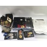 A collection of Masonic jewels and regalia.