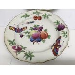 Two 18 th century Chelsea style plates decorated w