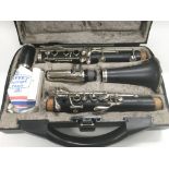 A cased Buffet B12 clarinet.