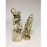 Two Japanese ivory carvings in the form of an elde