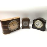 A collection of three vintage clocks, comprising o