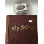 A vintage post card album And large collection of