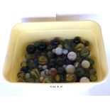 A large collection of marbles.