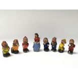 A vintage set of Snow White and the seven dwarves.