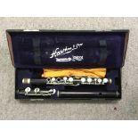 A vintage cased S.Quilter flute. (Split to side).