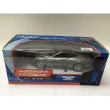 The James Bond Aston Martin V12 Vanquish 1:18 scale collectable model car. With complete original