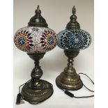 Two Moorish style lamps decorated in geometric blu