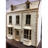 A Modern dolls house containing A small collection