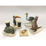 Four Carltonware Guiness advertising figures and a