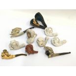 A collection of early Novelty Meerschaum and clay