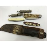 A hunting knife, three pen knives, together with t