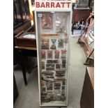 A vintage collection of cased Barrett’s sweets. 132 x 38cm.