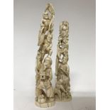 Two ivory carved okimonos in the form of Gods of w