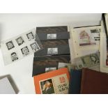 A collection of stamps and an album of coins inclu