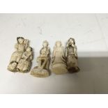 A collection of Japanese ivory carvings in the for