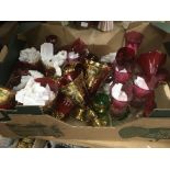 A box of cranberry and red glass items.