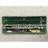 A cased Rundall & Carte flute.
