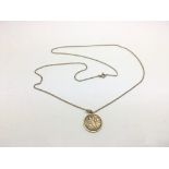 A 9ct gold St Christopher with attached chain, app