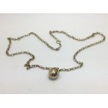 A Masonic ball on a 9ct gold chain, approx 18g.