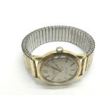 A gents 18ct gold Omega Seamaster watch.