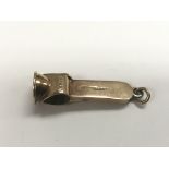 A 9ct gold Asprey cigar cutter, approx 8g.