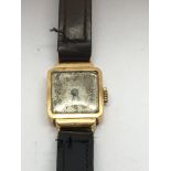 An 18ct gold cased ladies watch. Some Wear to the