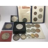 A 1951 Festival of Britain coin and other coinage.