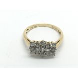 An 18ct gold diamond cluster ring, approx 3.8g and