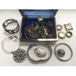 A collection of silver and white metal jewellery.