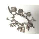 A silver late 1960s / early 1970s charm bracelet w