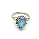 A 9ct gold pear shaped topaz ring, approx 3g and a