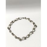 A modern design silver necklace by Burkmar, Comple