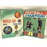 A 1966 World Cup book and one other vintage footba
