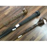 Three tribal staffs with carved decoration