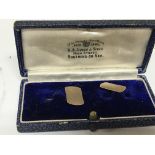 A pair of boxed 9carat gold cufflinks in original