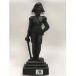 A cast iron door stop in the form of Napoleon