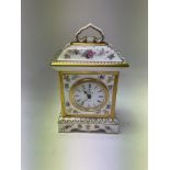 A Royal Crown Derby porcelain mantle clock in Roya