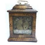 An olive wood period pad top timepiece mantle cloc