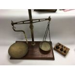 A set brass beam balance scales. Approximately 60c