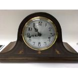 An Edwardian mahogany mantle clock the silvered di