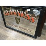 A Guinness Extra stout advertising mirror 90 cm by 65 cm