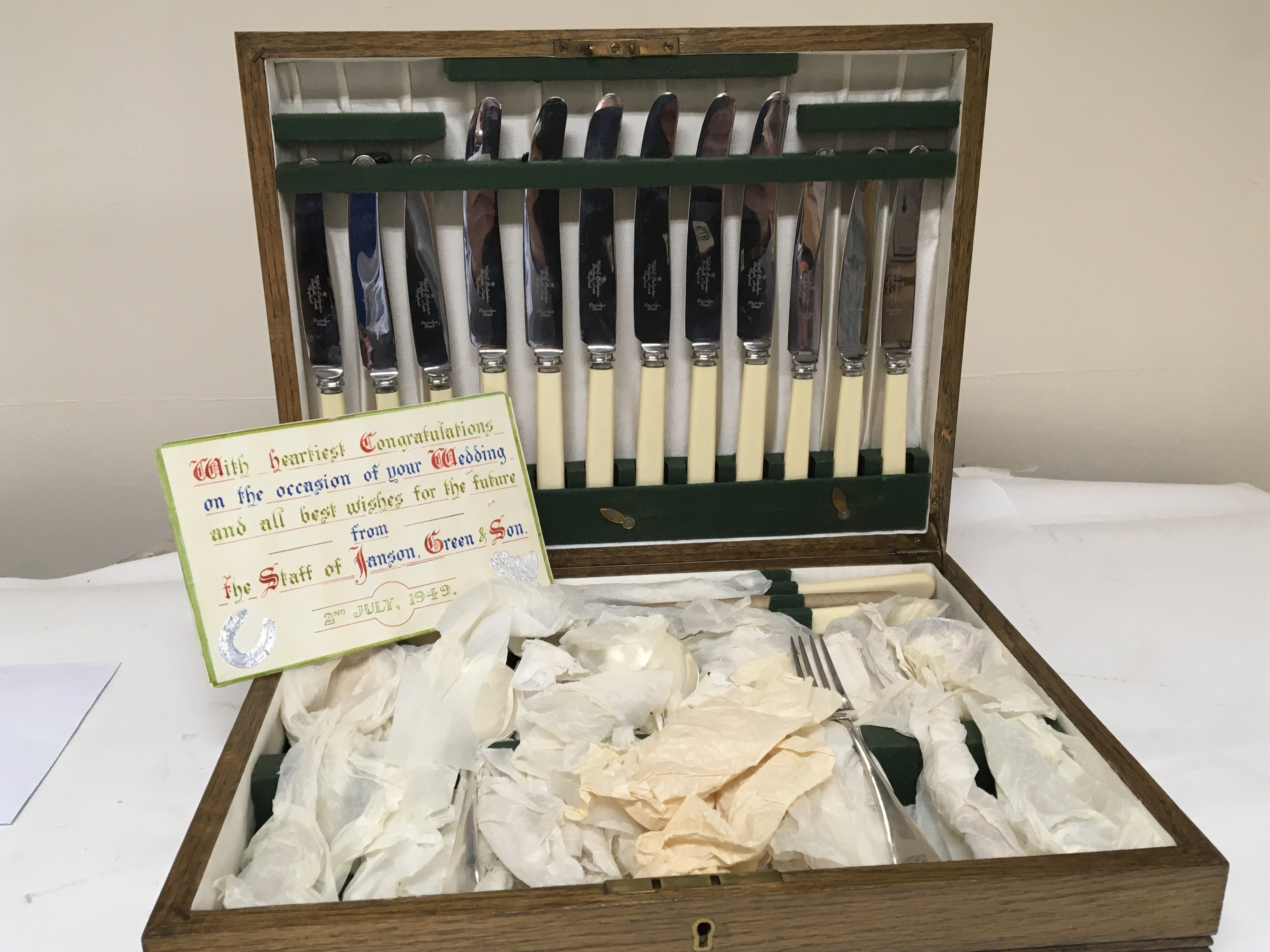 An oak canteen of cutlery presented in 1949 an most probably unused.