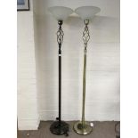 Two standard lamps with Metal bases, having pierced twist design to the top and glass shades.