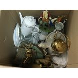 A collection of ceramics and brass ware.