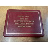 A cased Royal Mint 1984-1987 £1 silver proof coin