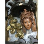 A box of carved Oriental items comprising buddhas,