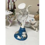 An unusual late 19th century German porcelain figu