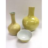 Three Famille Juan items comprising two vases and